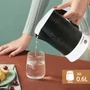 Kép 10/10 - 650 W 0,6l műanyag utazó elektromos vízforraló