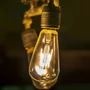 Kép 12/20 - 4W E27 LED filament égő 2200K borostyán ST64